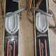 Old skis wooden and its pair of sticks