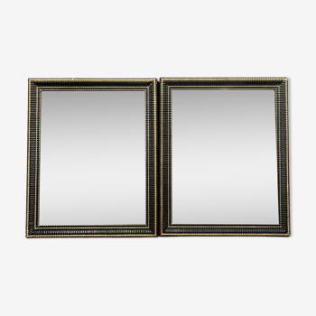 Paire de miroirs anciens époque Napoléon III en bois noirci et doré vers 1850