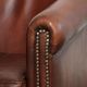Set of 2 sheepskin club armchairs in a dark cognac colour