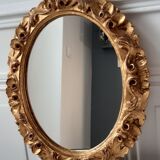 Old mirror in gilded wood late nineteenth