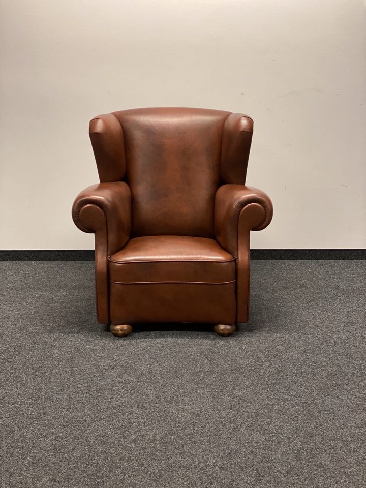 Vintage chesterfield style wingback armchair