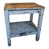 Patinated wood side table