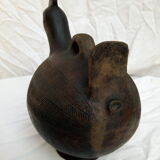 Pourer, terracotta teapot. Hen.