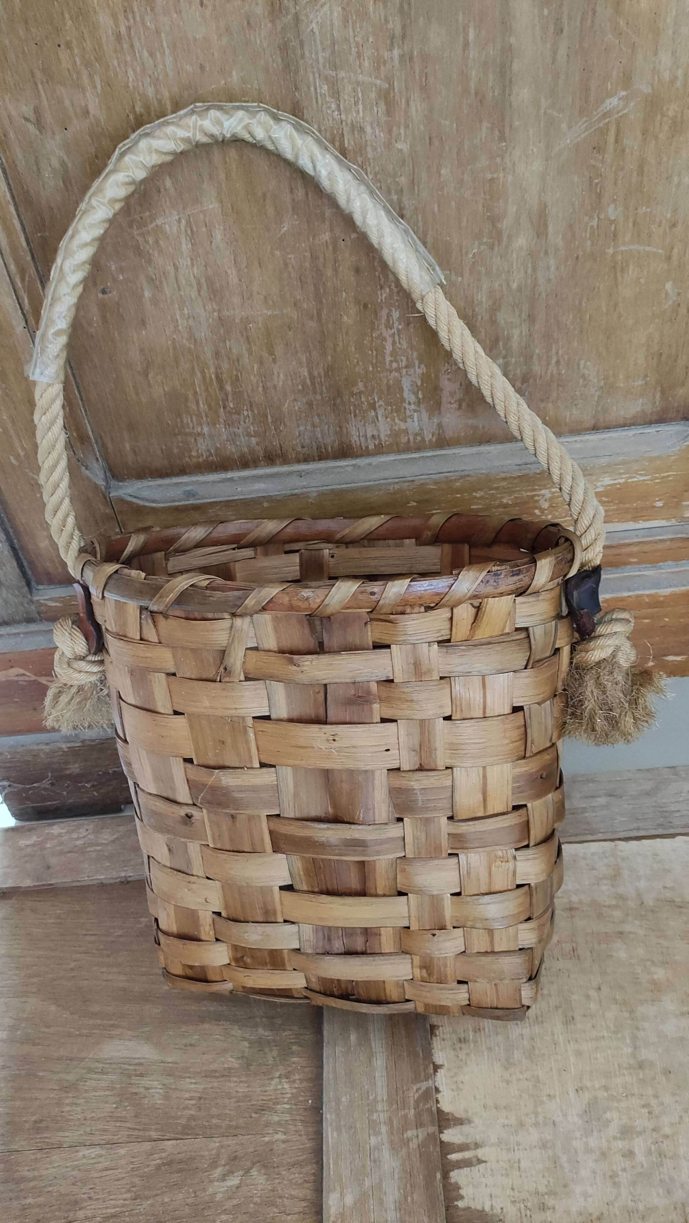 Basket or bag to put or hang leather, rope, brass and rattan