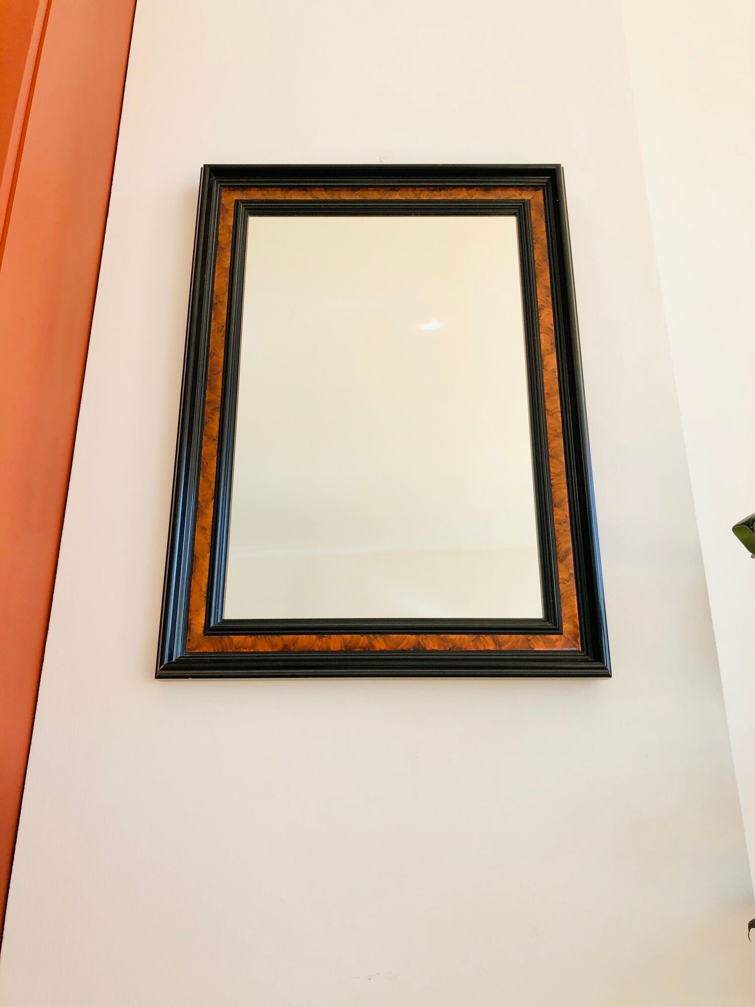 Old wall mirror 72 x 52 cm in black wood and faux mahogany