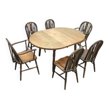 A slightly weathered Windsor wheelback dining set (7) by Oirschotse Meubelindustrie 1950s