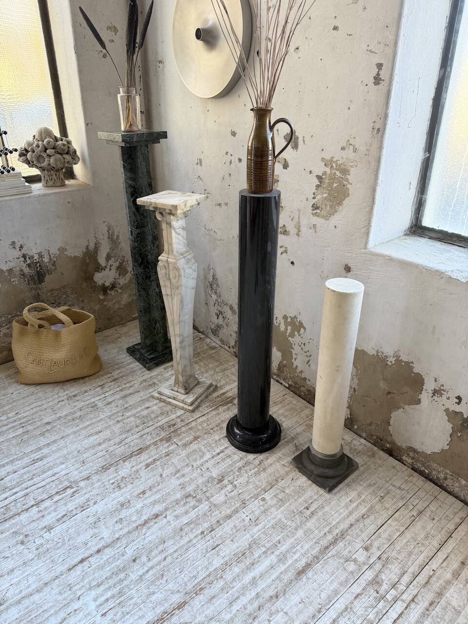 Set of 4 marble columns or pedestals.