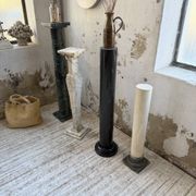 Set of 4 marble columns or pedestals.