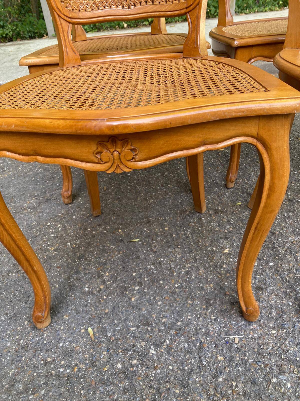 4 Louis XV dining chairs in light solid wood with caning.