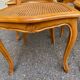 4 Louis XV dining chairs in light solid wood with caning.