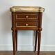 Pair of mahogany and brass side tables or bedside tables with Carrara marble tops.