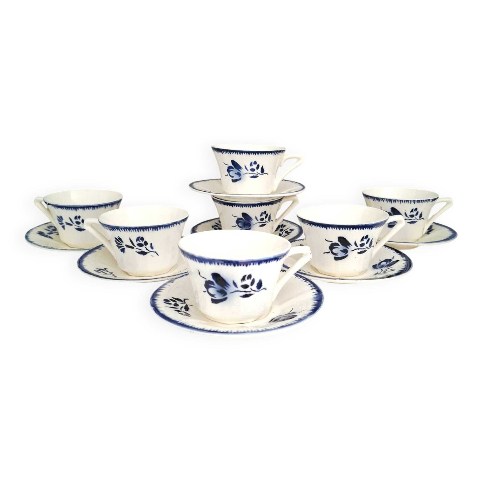 Antique cups with iron earthenware saucers