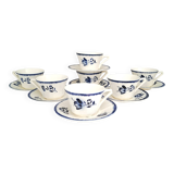 Antique cups with iron earthenware saucers