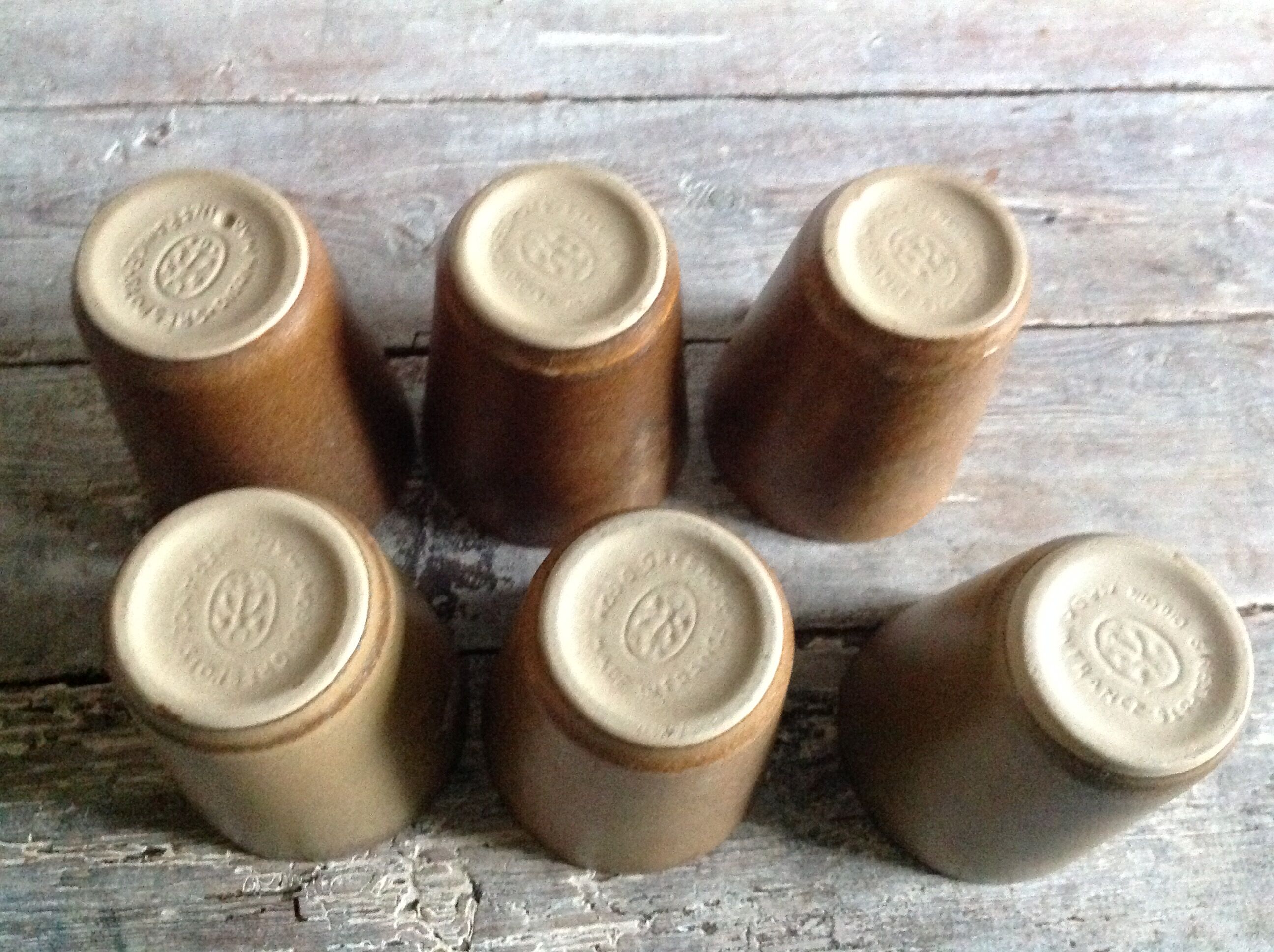 Series of 6 sandstone cups