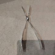 Silver-plated asparagus tongs with guilloche decoration and goldsmith Christofle