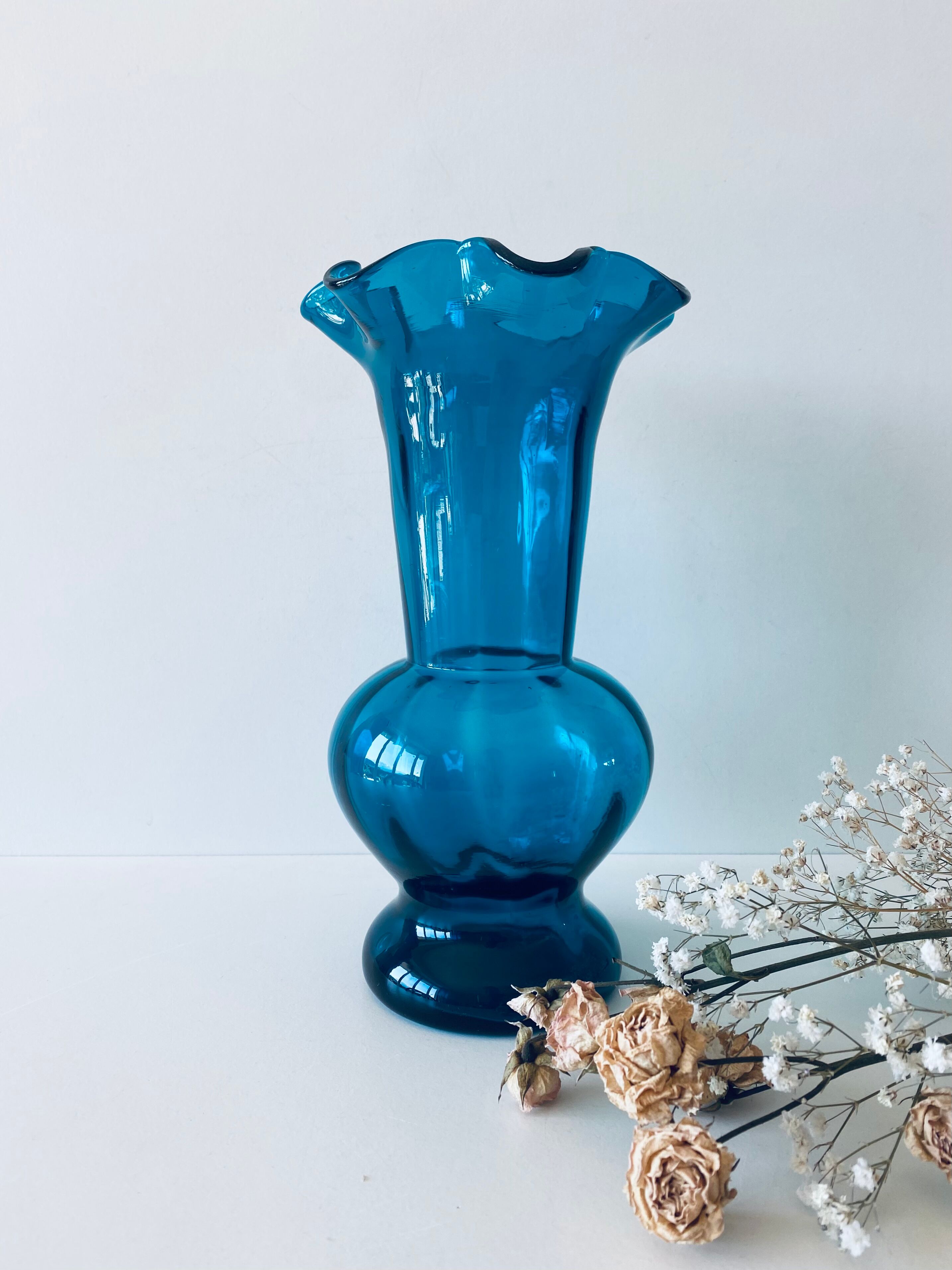 Old blue duck vase with collar