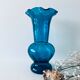 Old blue duck vase with collar
