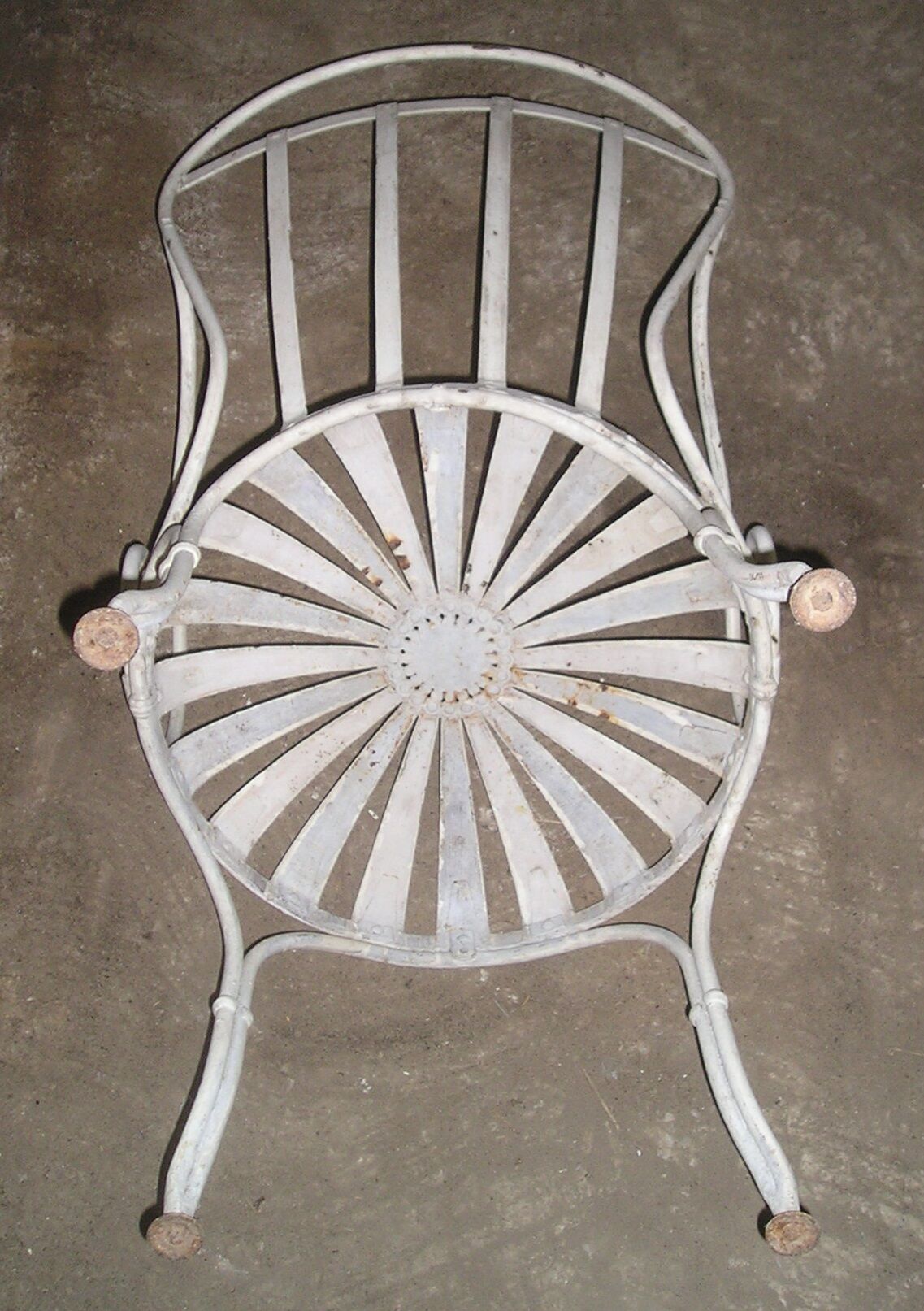 Wrought iron garden armchair with riveted flexible blades early XXth