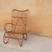 Vintage rattan chair by Louis Sognot