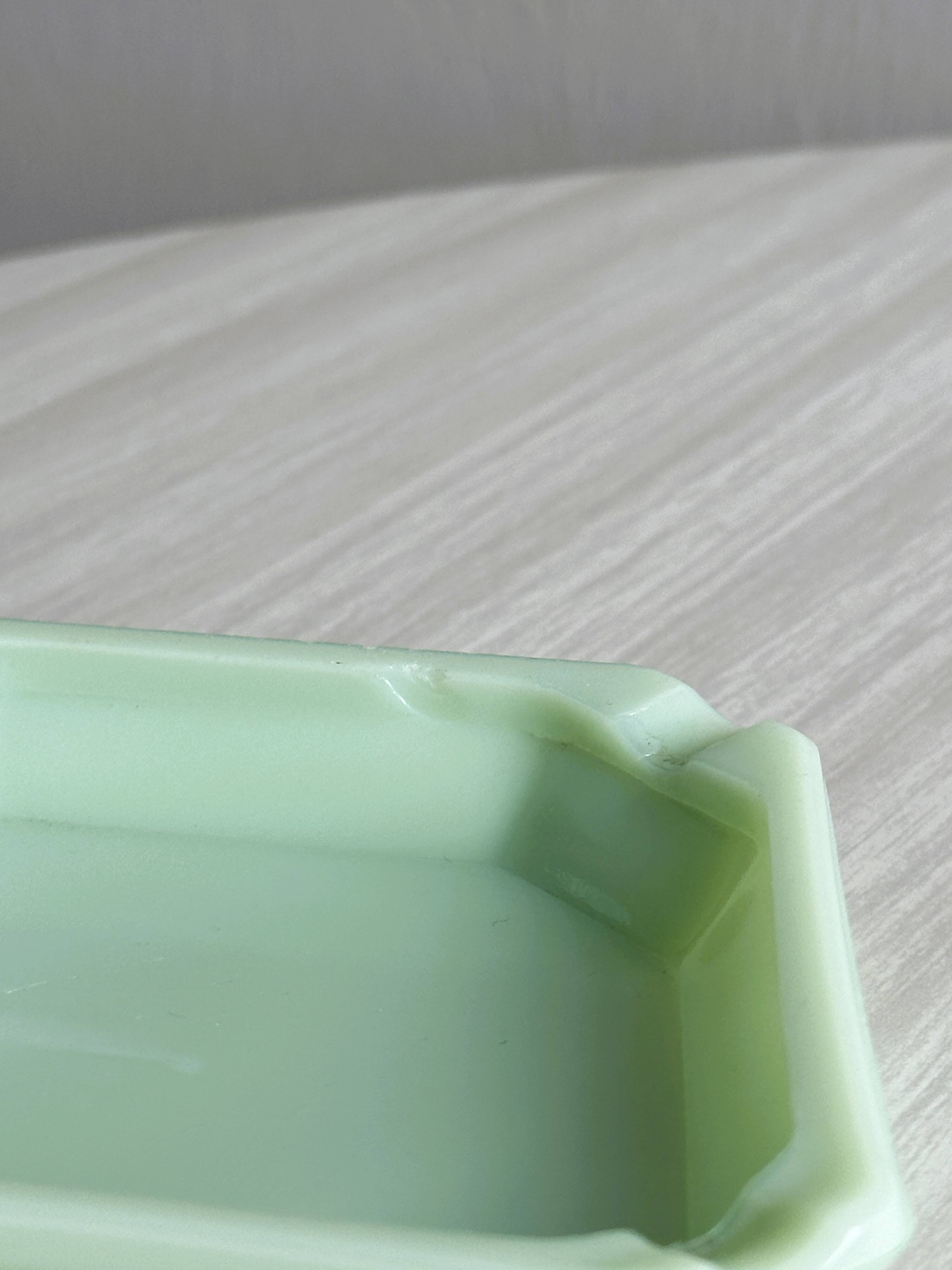 Vintage green opaline glass ashtray