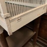 Cage has iron birds and prison volière has 20th century bars