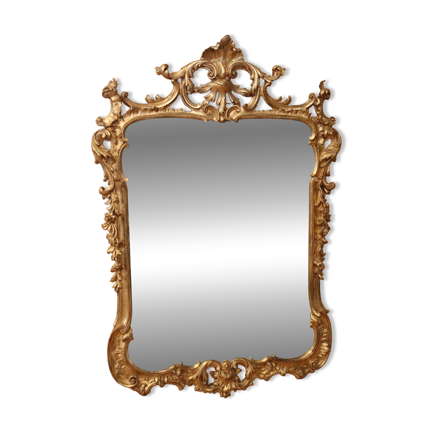 Golden wooden mirror in Louis XV style
