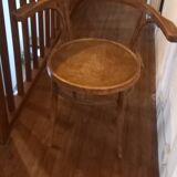 Curved wood armchair
