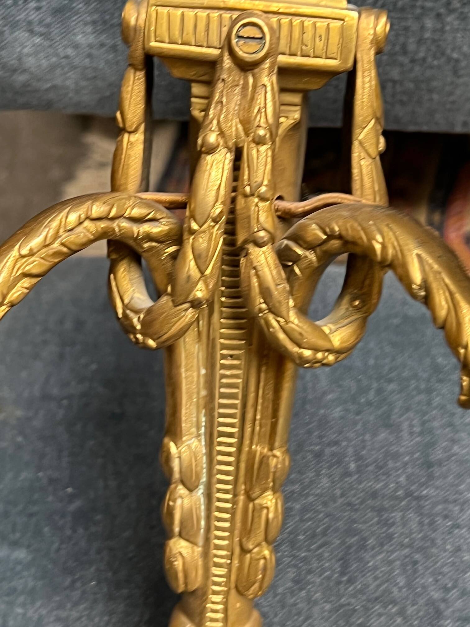 Pair of wall lights. Solid gilded bronze.