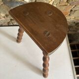 Low tripod stool with turned legs