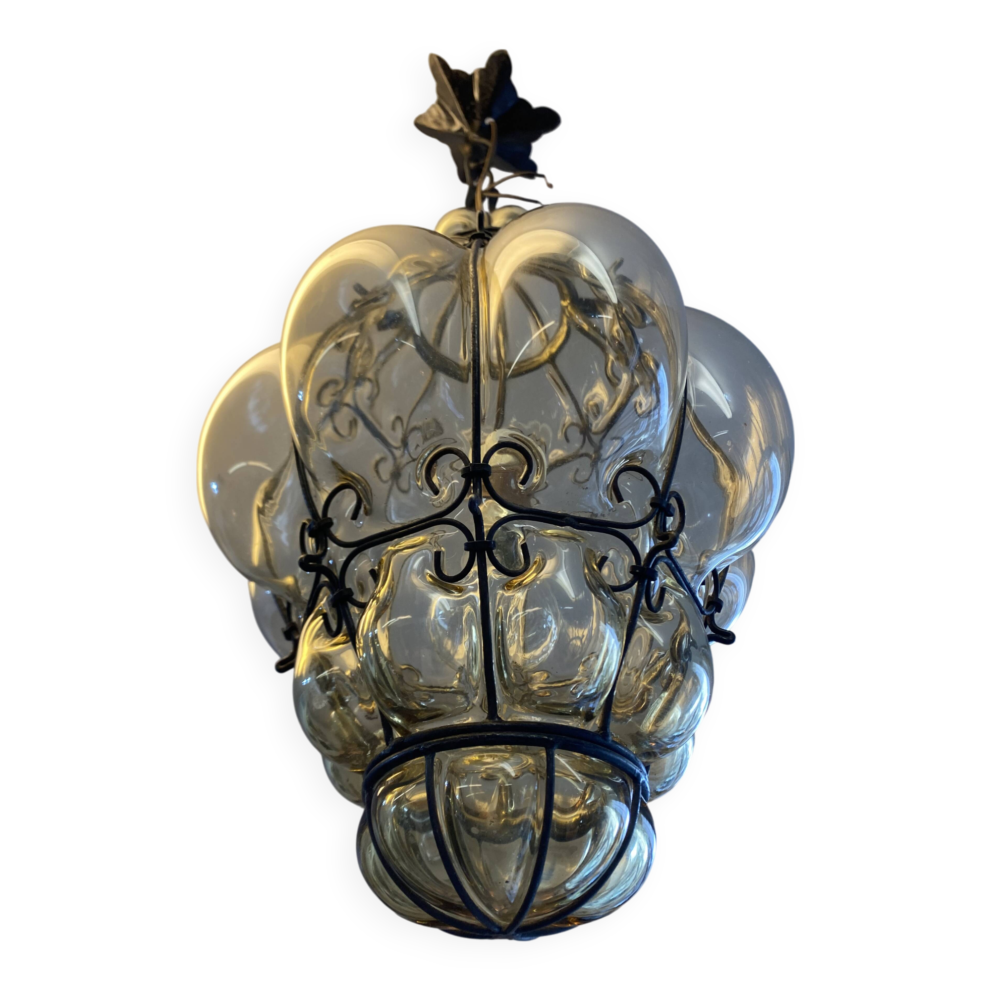 Blown glass and metal lantern