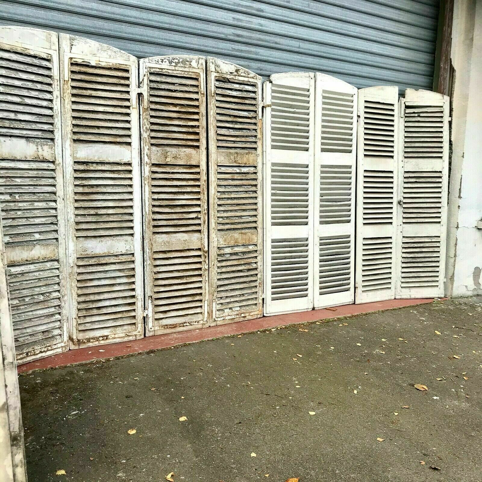 Suite of four pairs of shutters in massive 19th century channel