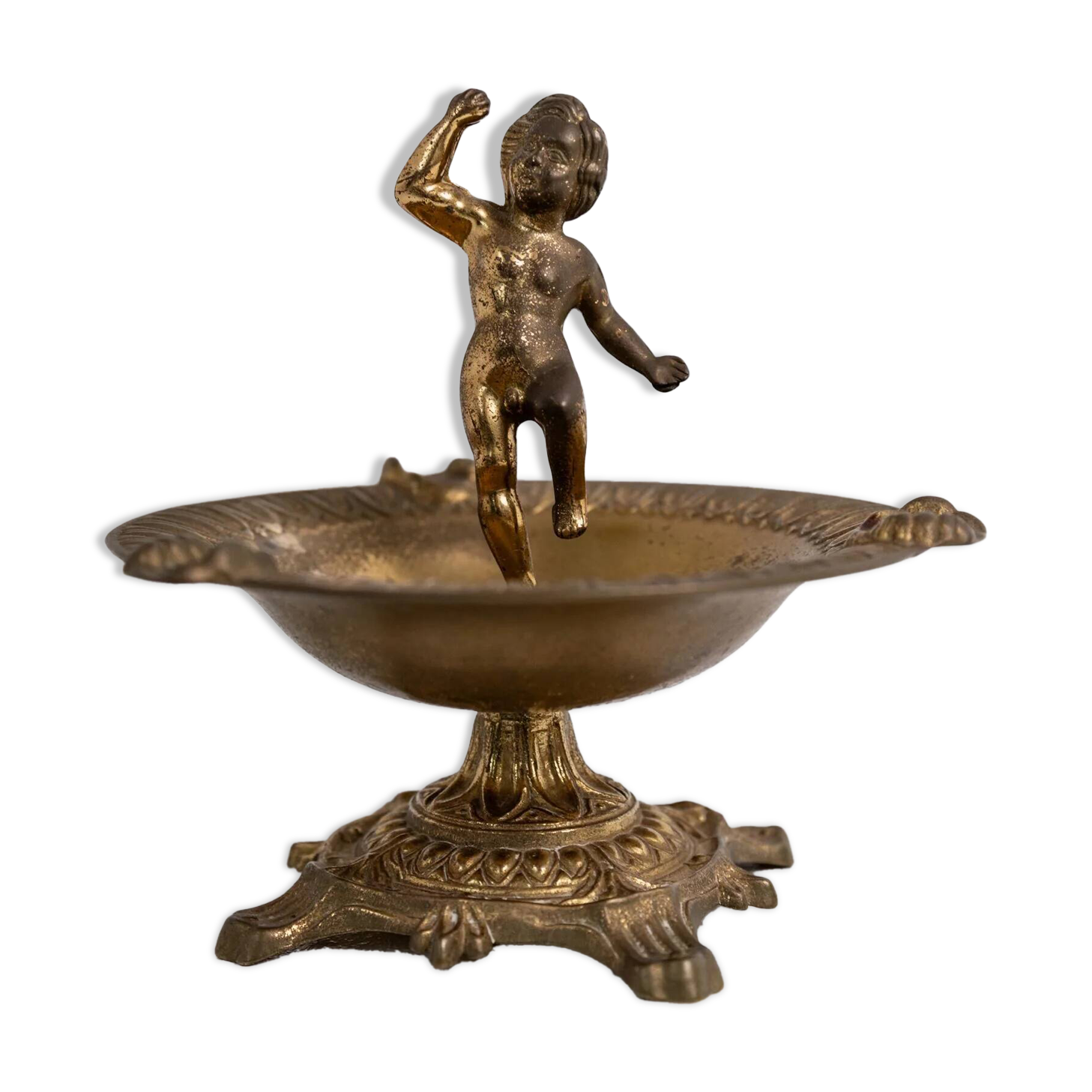 Vintage brass ashtray from the 1940s with a nude boy figurine on a footed base.