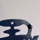 Kettle-shaped cast iron trivet