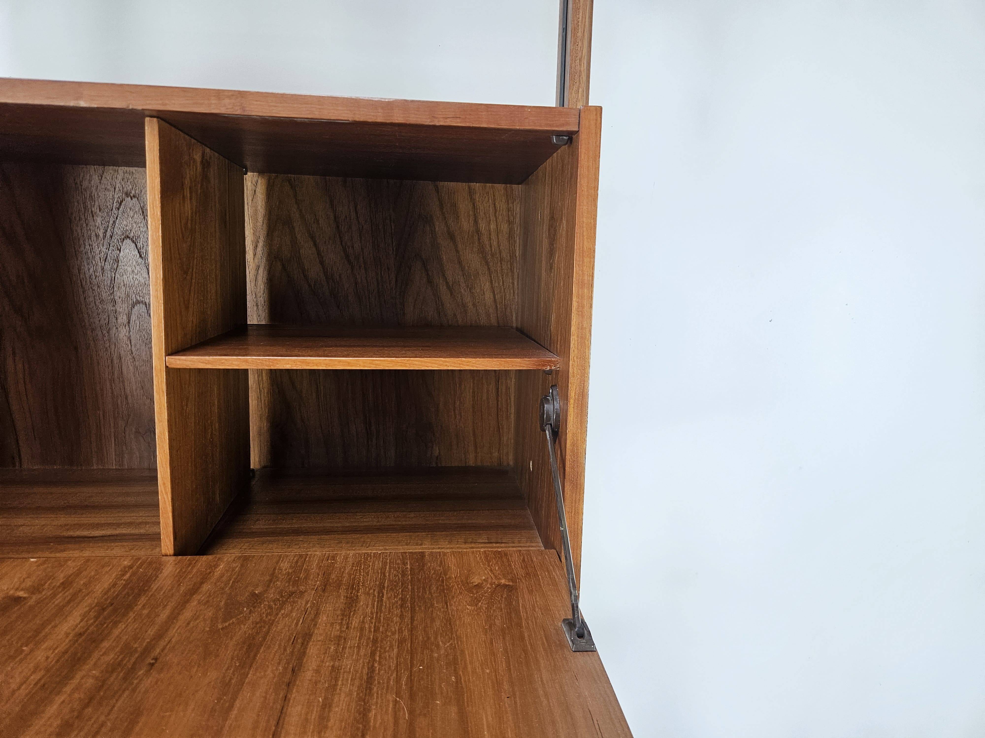 1960s teak floor/sky bookcase with shelves and compartment