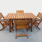 Vintage garden furniture set consisting of a table with extensions and 4 armchairs