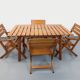 Salon de jardin vintage composé d’une table avec rallonges et 4 fauteuils
