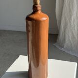 Large antique stoneware bottle with a small cork stopper