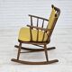 Années 1960-70, design danois par Farstrup Stolefabrik, rocking chair retapissé.