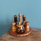Oil, vinegar, mustard, pepper, salt, olive wood servant from Spain.