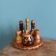 Oil, vinegar, mustard, pepper, salt, olive wood servant from Spain.