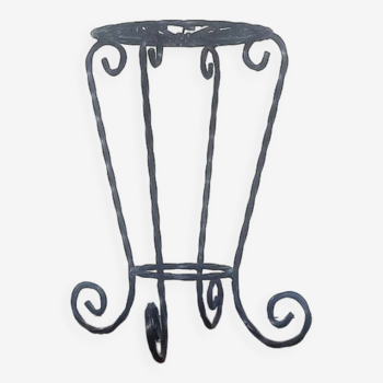 Black wrought iron support for plants