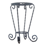 Black wrought iron support for plants