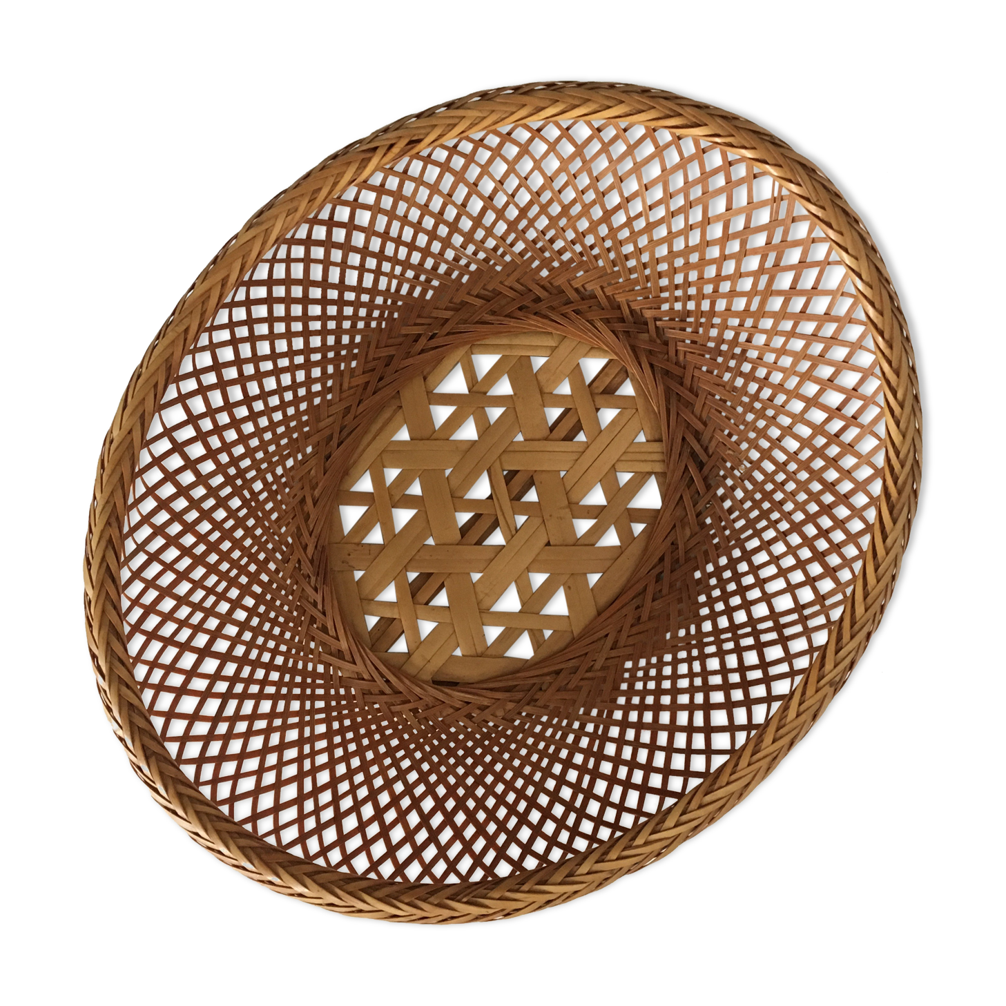 Braces of wood and woven rattan oval basket