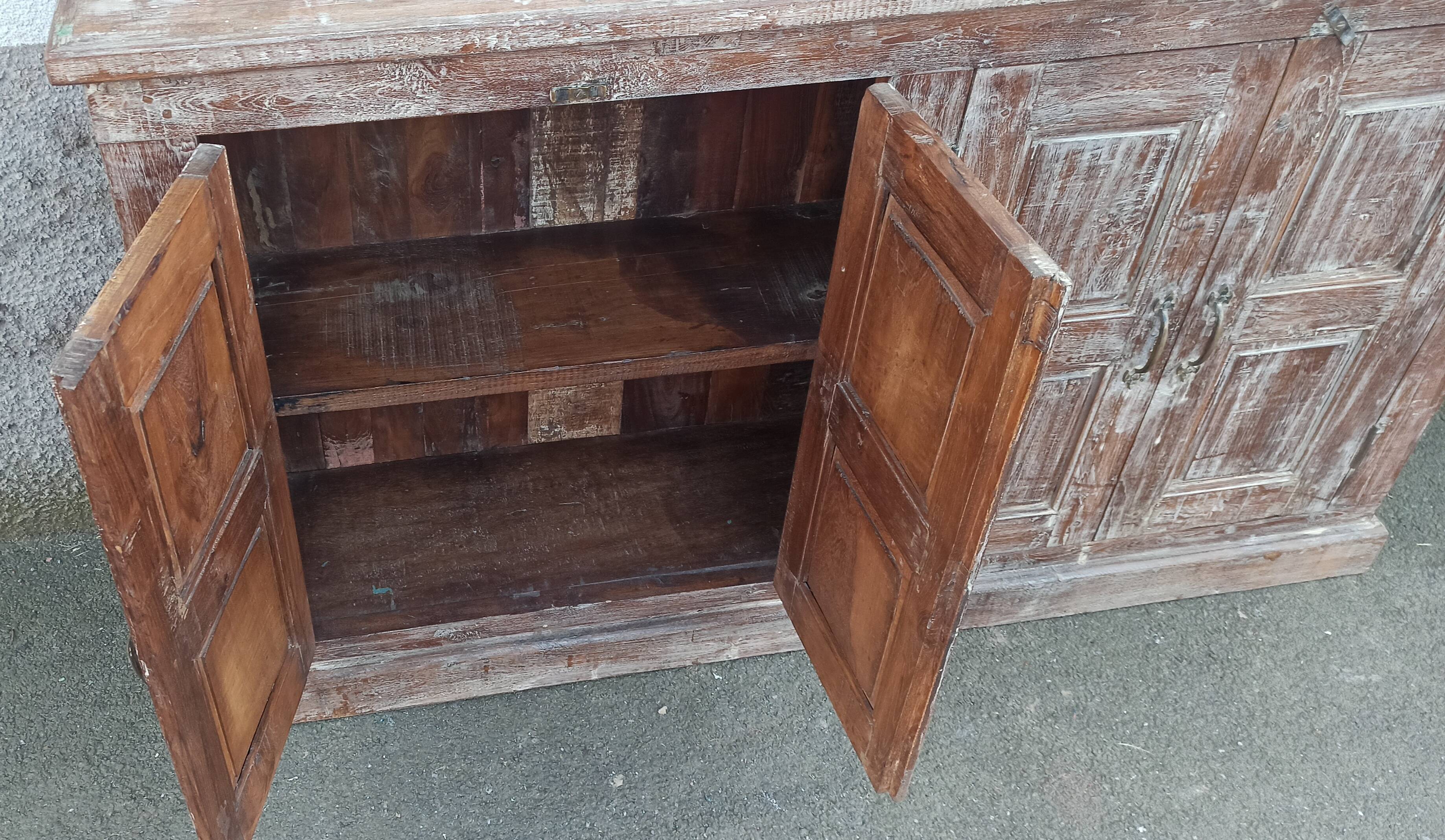 Old wooden sideboard with 4 doors