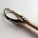 Golden sugar tongs