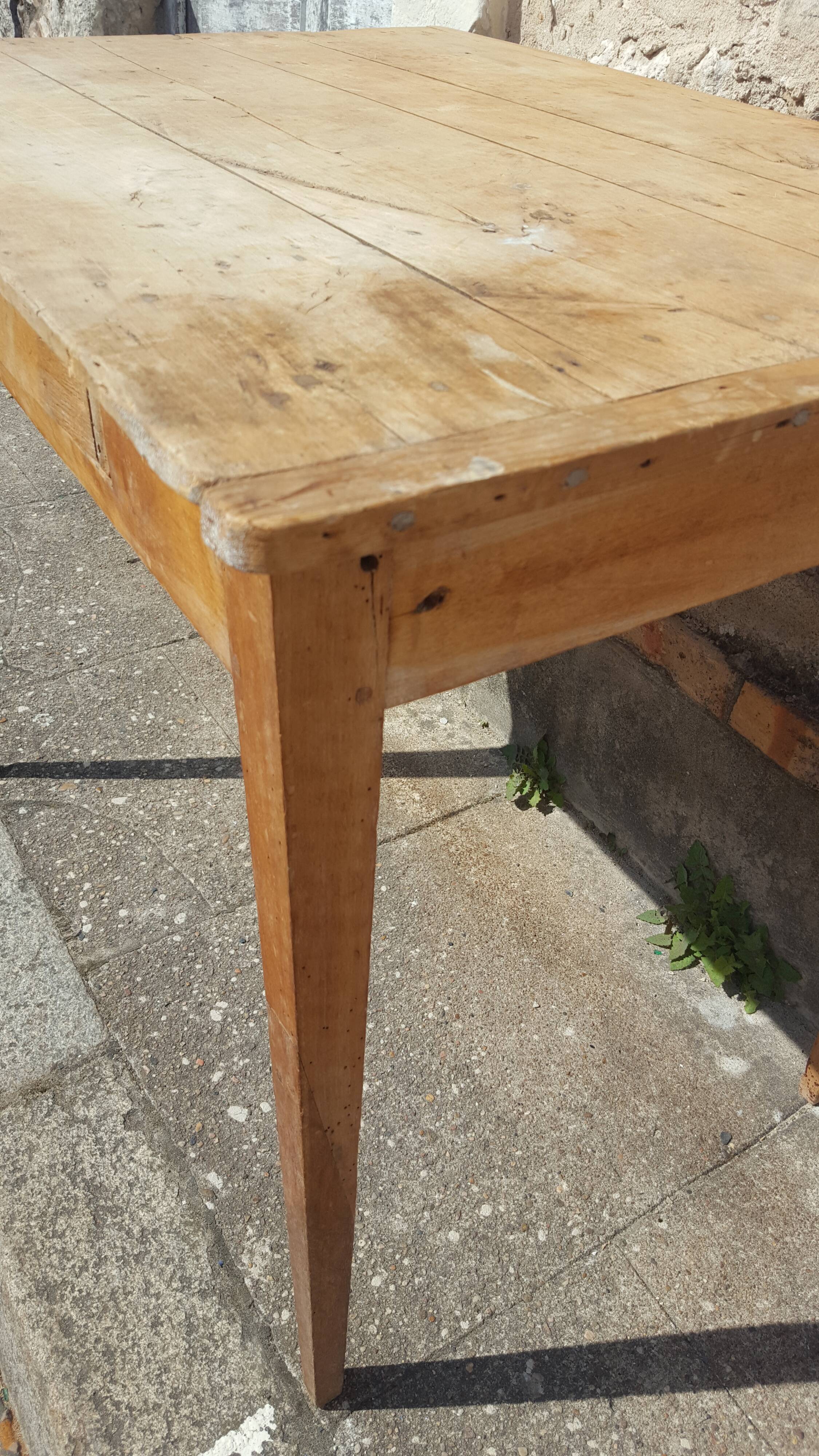 Raw wood farm table with drawer