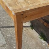 Raw wood farm table with drawer