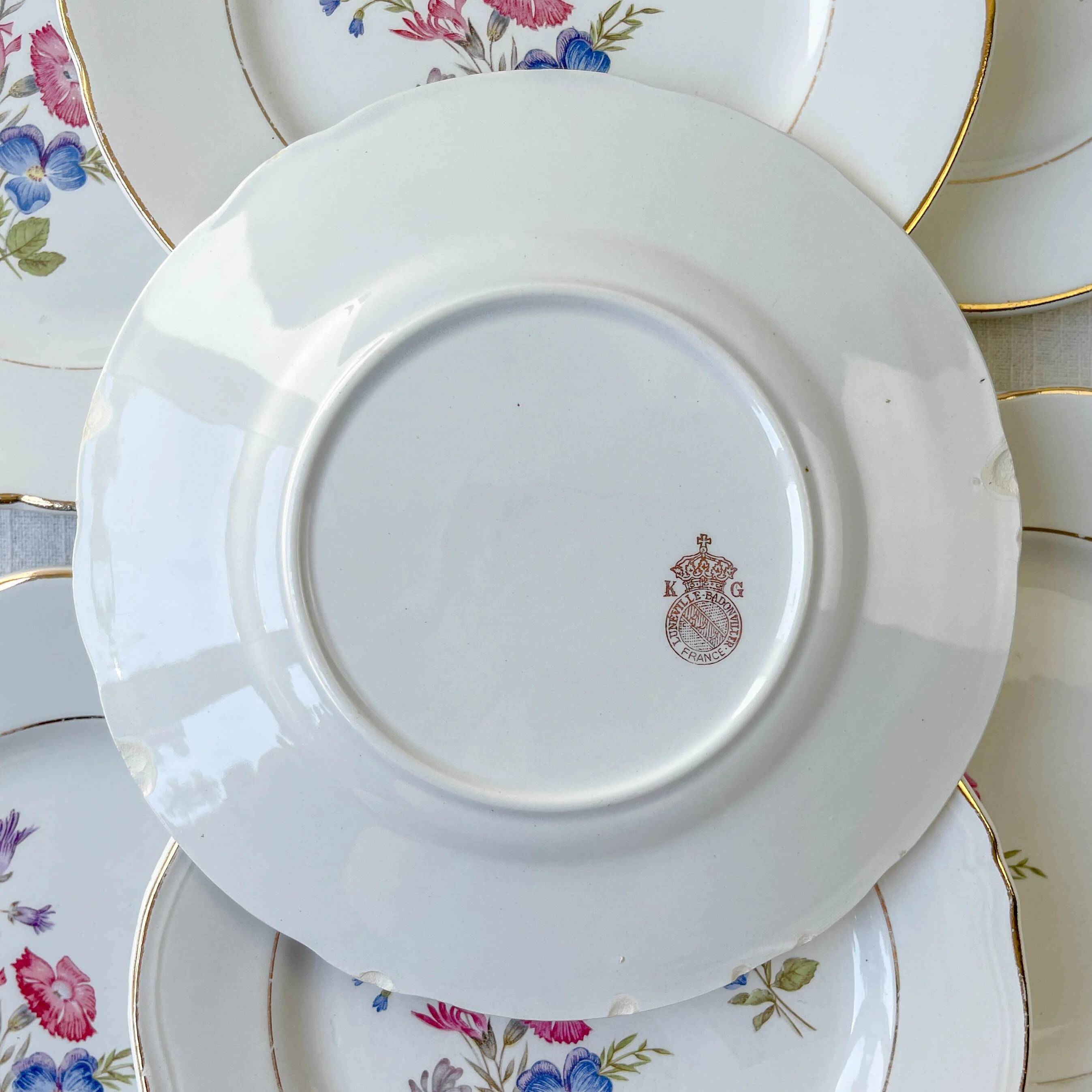 7 small vintage porcelain plates with floral pattern KG Luneville