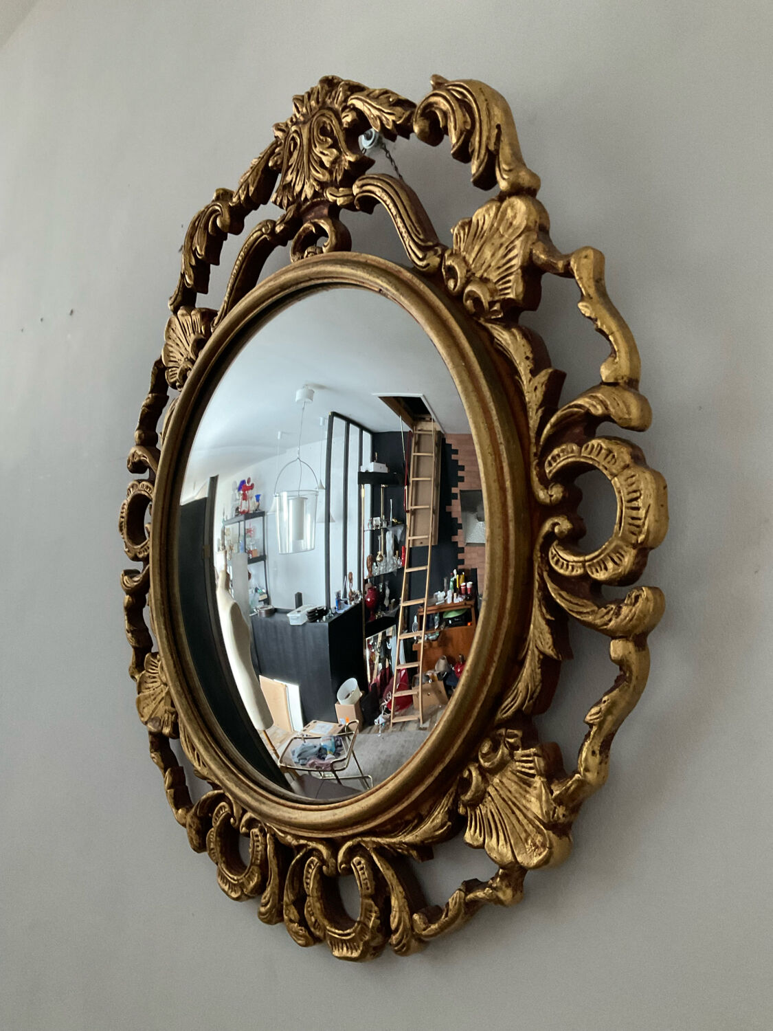 Ancient witch's eye mirror Dollanzo Italy in gilded wood