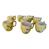 Eight earthenware mugs